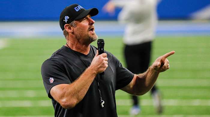 Dan Campbell speaking at a Lions practice.